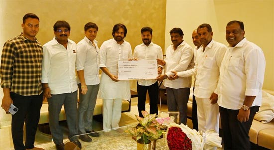 Photo Moment: Pawan presented a check of 1 crore to Telangana CM