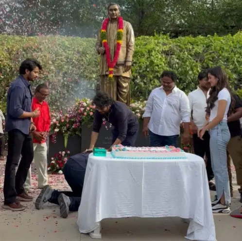 Photo Moment: Emotional Akhil falls at Nagarjuna’s feet during Lenin success celebrations