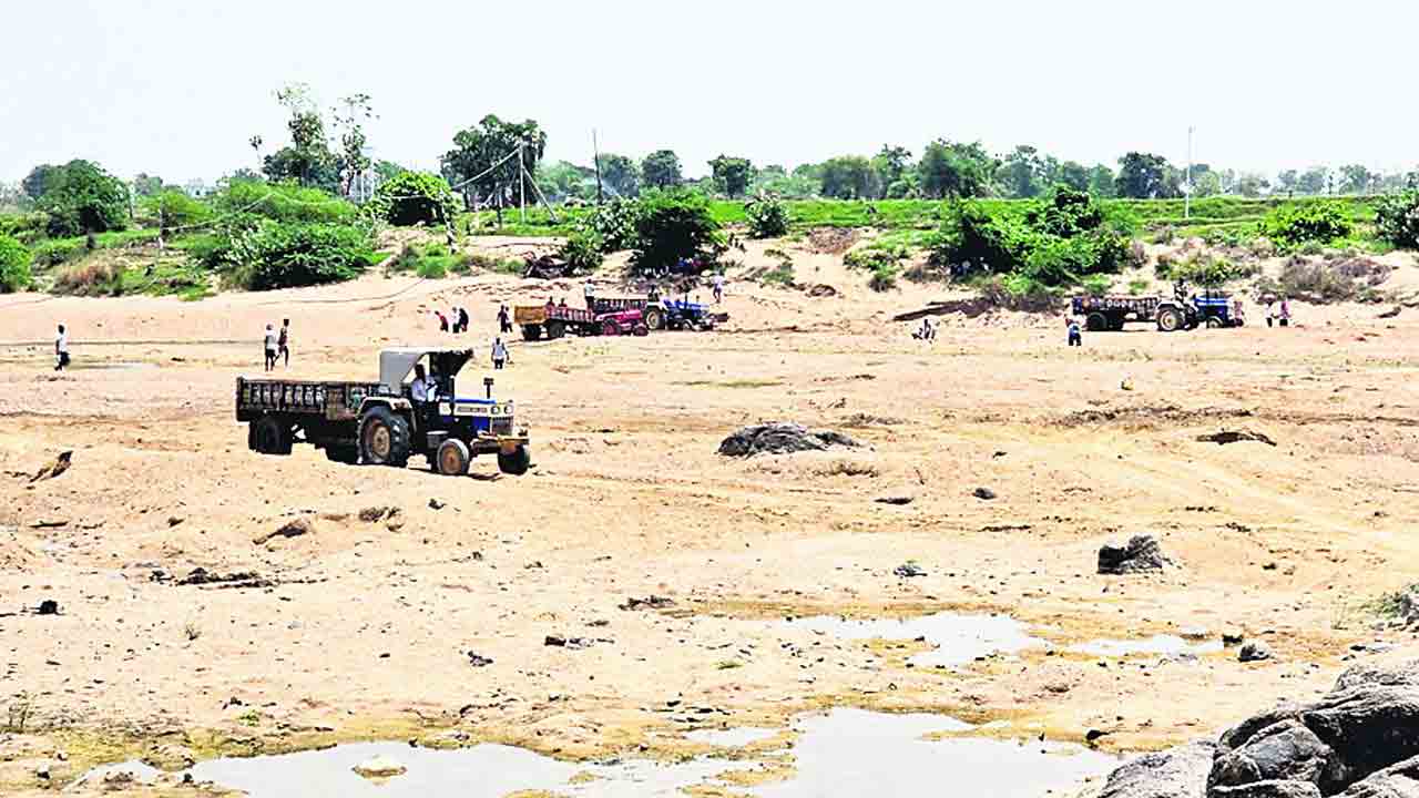 Sand mining scam: Akeru brook exploited in Godavari's name అనుమతి కొంత.. రవాణా కొండంత